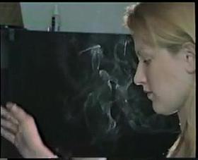 Awesome blonde smoking a cigarette!