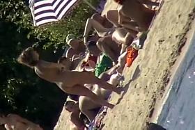 The family that sunbathes in the nude together, stays toget