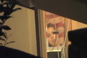 Peeping a girl touch herself in bed