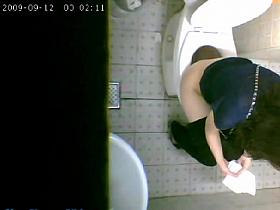 One girl pissing on toilet after another on the spy cam