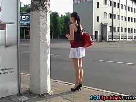 Glamorous brunette hair in street upskirt clip