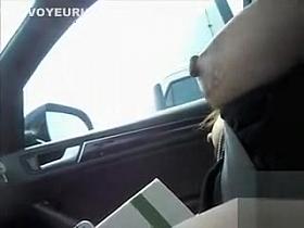 Showing the naked boobs to the truck driver