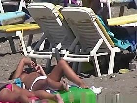 Topless women enjoying the sun