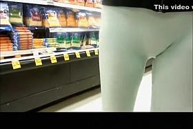 Woman in tight white panties at the supermarket