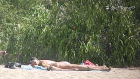 Beach nudist hunter voyeuring nude bodies from behind bushes