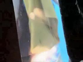 Trying to fix bikini in beach cabin girl gets tits spied