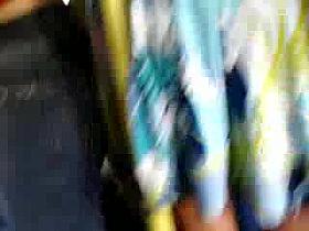 Caressing her beautiful buttocks on the bus