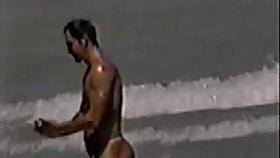 fellows in strap on the beach