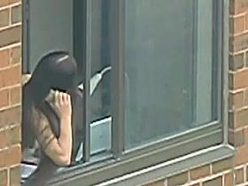 Topless Girl by the window