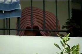 MILF balcony upskirt