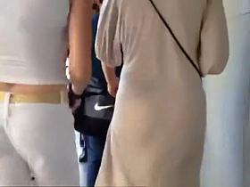 Woman in see through dress black thong