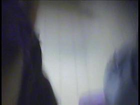 Female towels nude body on dressing room spy camera