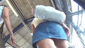 Rear and frontal upskirt voyeur shots of a curvy lady