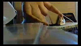Voyeur - France. Big Madame does ironing naked