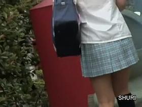 Tight little Asian bimbo gets spanked while taking street walk