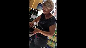 skinny blonde milf in adidas leggings in german supermarket