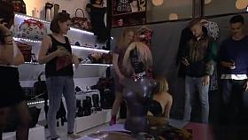 Naked blonde kneeling in public streets