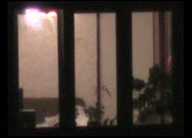 Naked woman in window