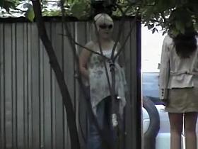 Hot brunette and blonde friend peeing outdoors