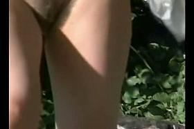 Mature pussy wide open on the beach captured on spy cam