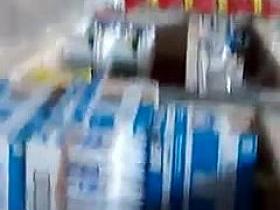 Candid redhead with sexy legs.