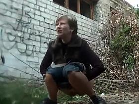 Fashionable milf caught when she pissed