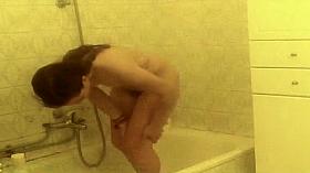 Sexy girl showers and wipes off