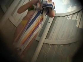 Teen caught in beach cabin drying