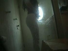 Spy cam sexy girl wearing on thong and pants after pissing