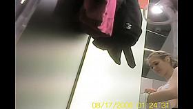 Blonde bimbo trying on to dress in hidden cam dress room