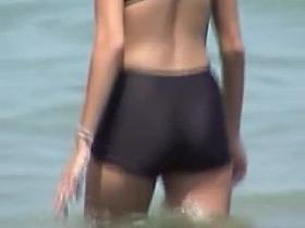 Candid babe wearing swimsuit with bra and black shorts 07e