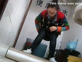 Nerdy chinese girl caught taking a leak