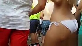 Slow motion dancing of a bikini ass