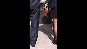 Girl with sexy legs in black pantyhose and high heels