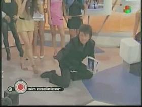 Sexy singer in a TV show lets the audience see up her skirt