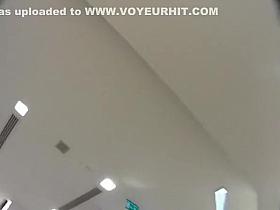 Woman in leopard pattern short skirt