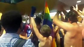 College nudists come through the main hall