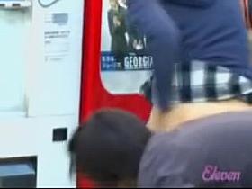 Asian schoolgirl street sharked at the vending machine.