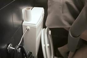 Public service announcement with a woman using a toilet