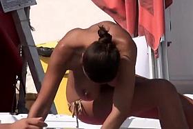 Funky boobs of a topless woman