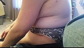 she was putting on her black pantyhose & fund a tear