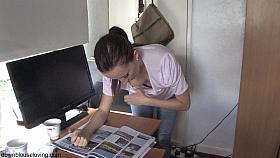 Brunette vixen reading a paper in a down blouse video