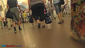 Hot g-string upskirt video of a slim brunette