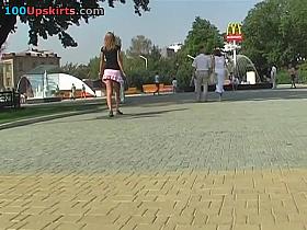 Playgirl in pleated pink mini