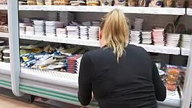 Girl in tan stockings in market