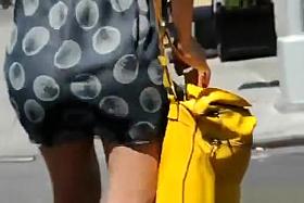 Woman Wearing See Through Dress in the Streets