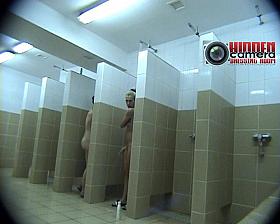 Hot babes caught taking a shower in a voyeur cam video