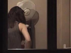 Spying on neighbour while she changes