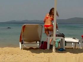 Sexy ass brunette chick in red bikini