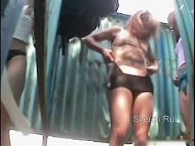 Beach girls changing bikinis and showing nude charms